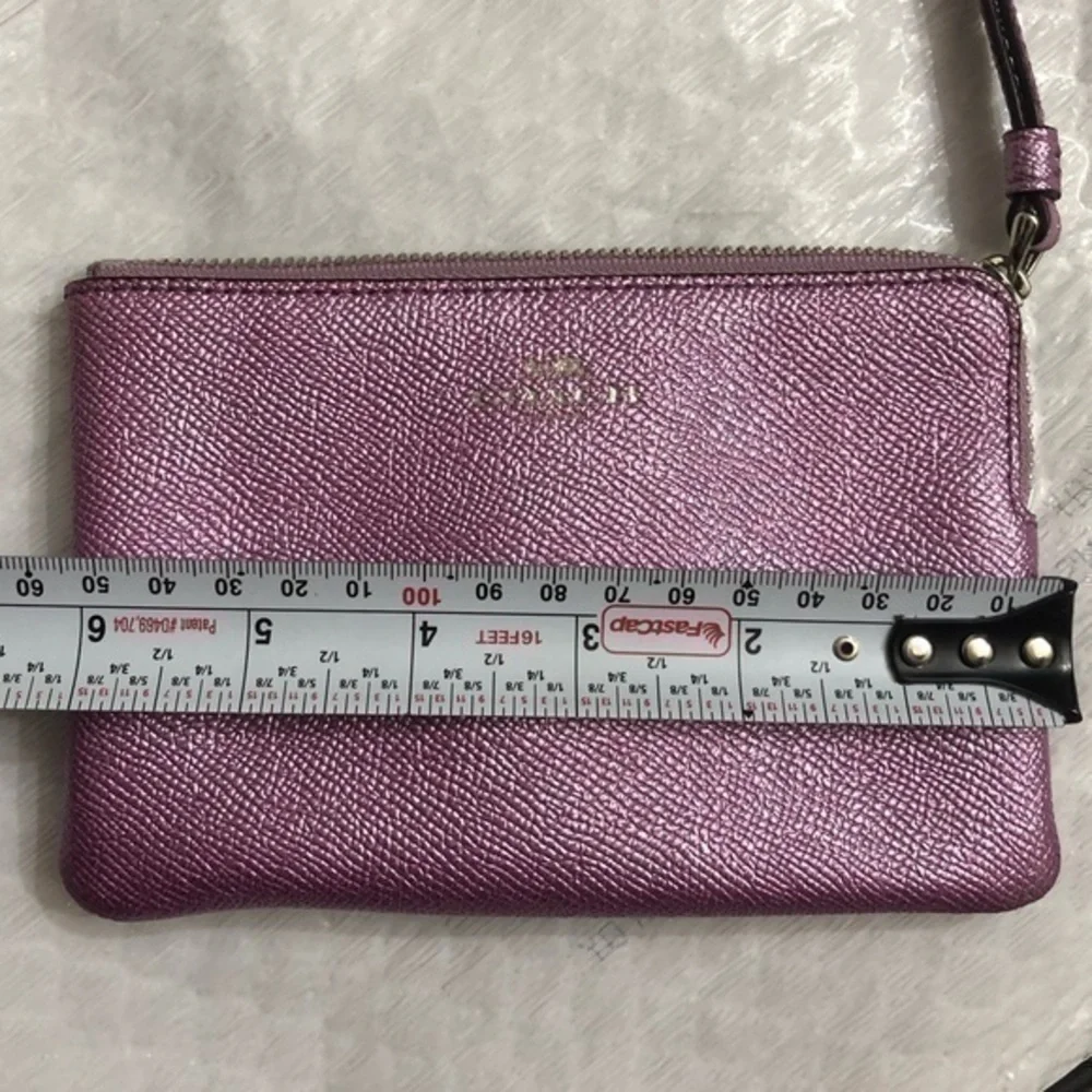Coach purple shimmer wristlet bag